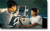 Medical electronic equipment maintenance is one of our responsibilities. A technician is explaining equipment operations to a nurse at the Tseung Kwan O Hospital.